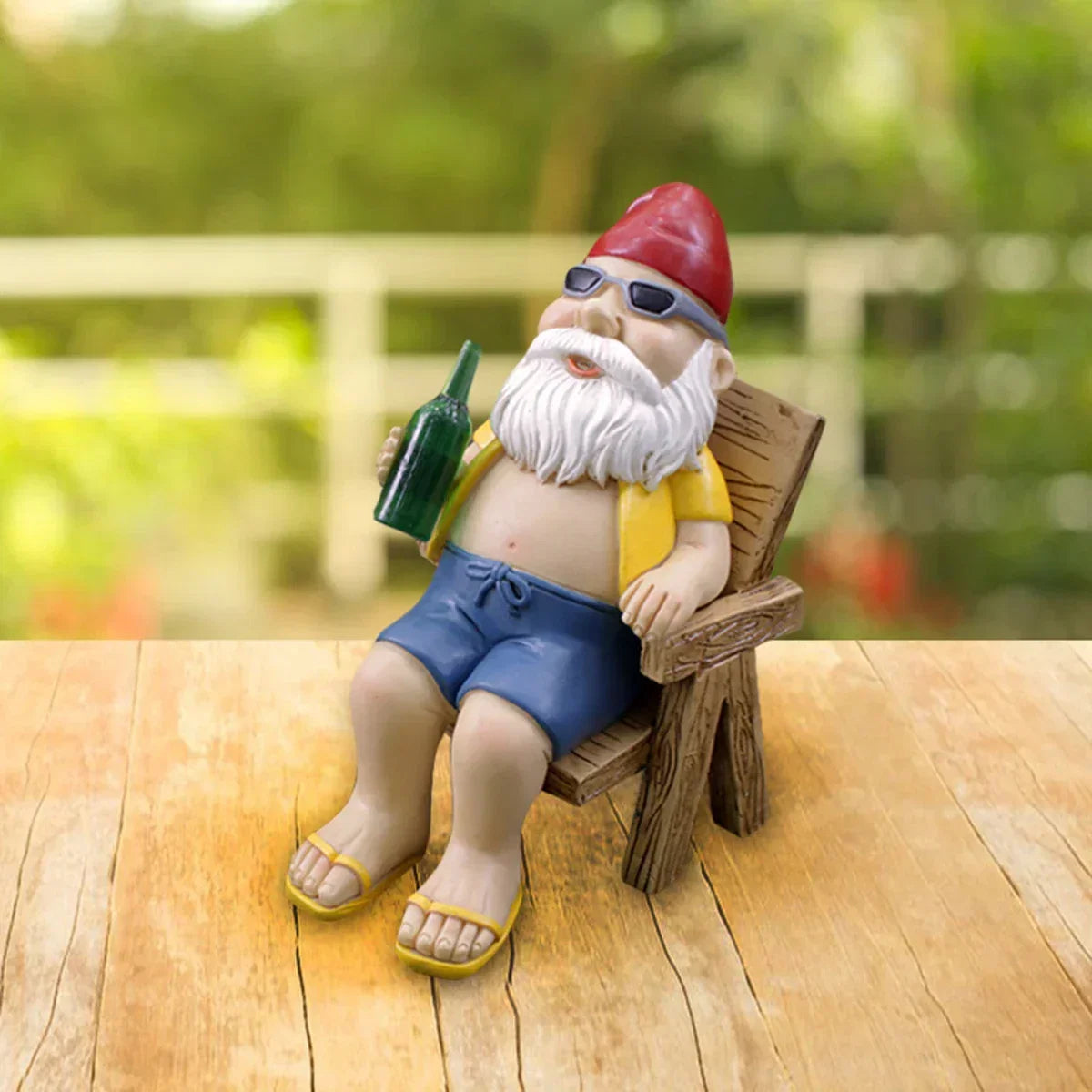 Garden Gnome Statue Sitting on Chair with Bottle